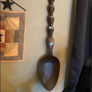 Wooden spoon and fork wall display